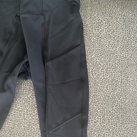 Black lulu legging size 2 never worn. Pocket details on side & back. Full length - Picture 3 of 4